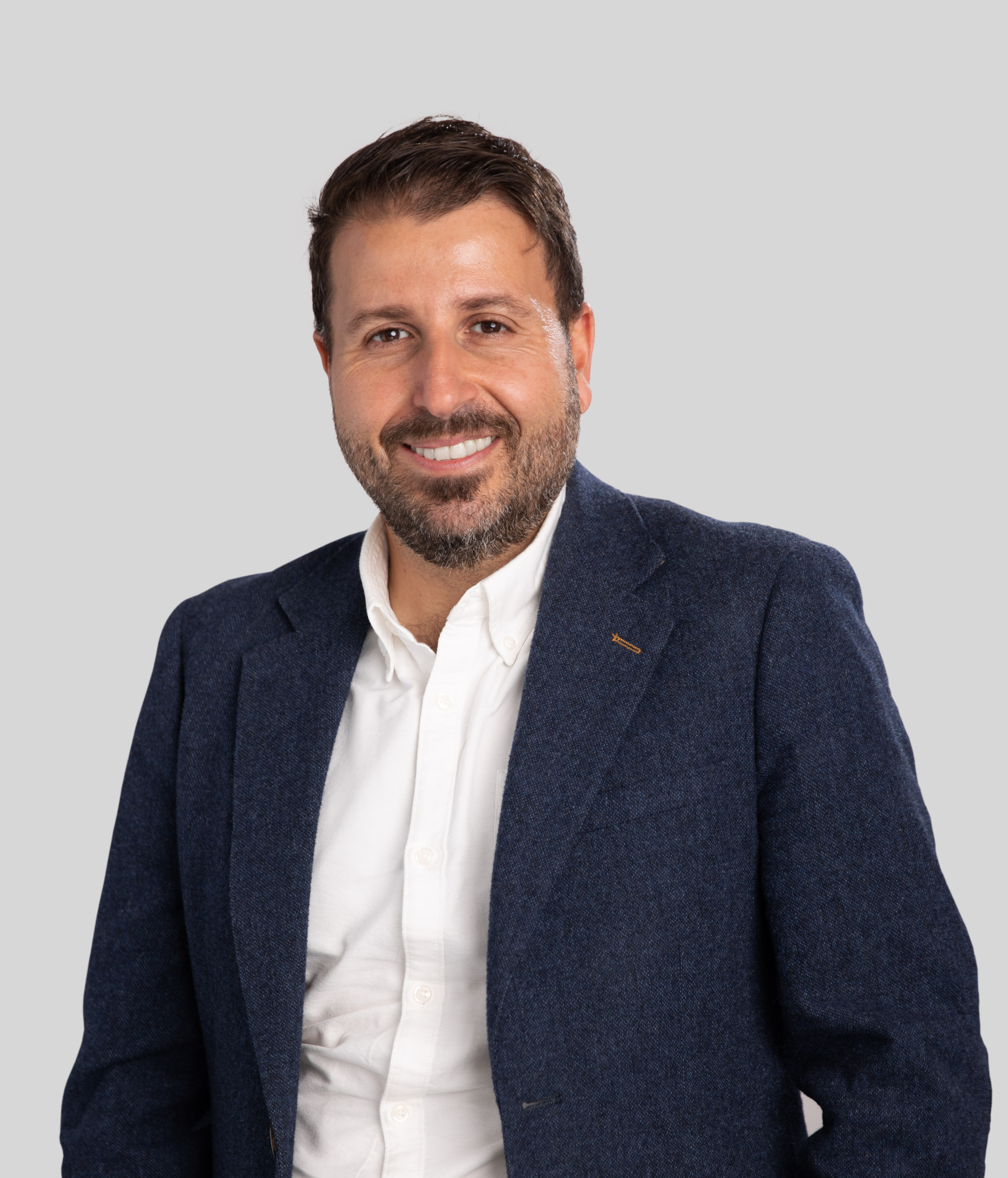 MEGT Executive Spiros Matsoukas clothing person human face collar blazer pocket dress shirt outerwear shirt smile man formal wear top button gentleman sleeve standing
