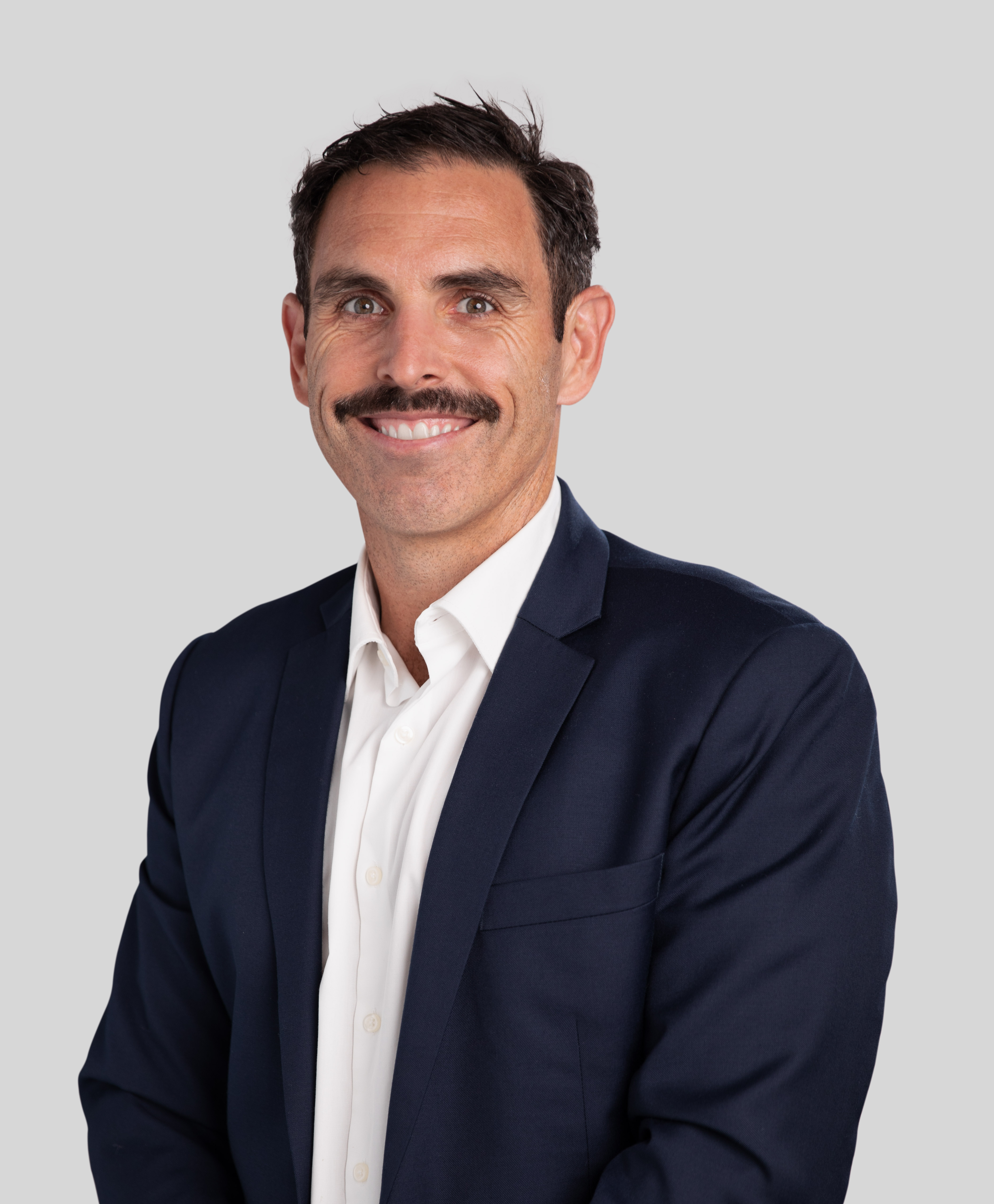 MEGT Todd Pavlou Executive clothing person human face formal wear collar blazer smile dress shirt shirt gentleman headshot white-collar worker man businessperson outerwear suit top pocket